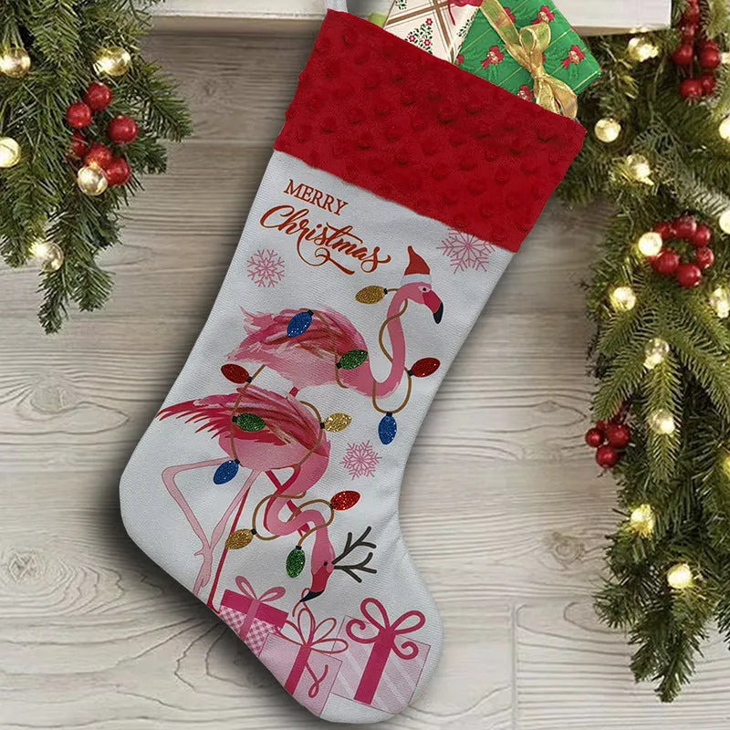 Red and white flamingo print cloth Christmas stocking hanging decoratively.