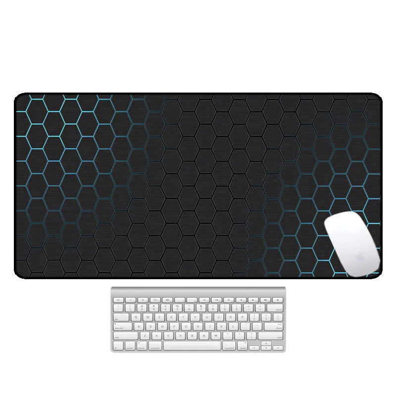 Large printed desk mat with natural rubber non-slip base on a wooden desk with keyboard and mouse.