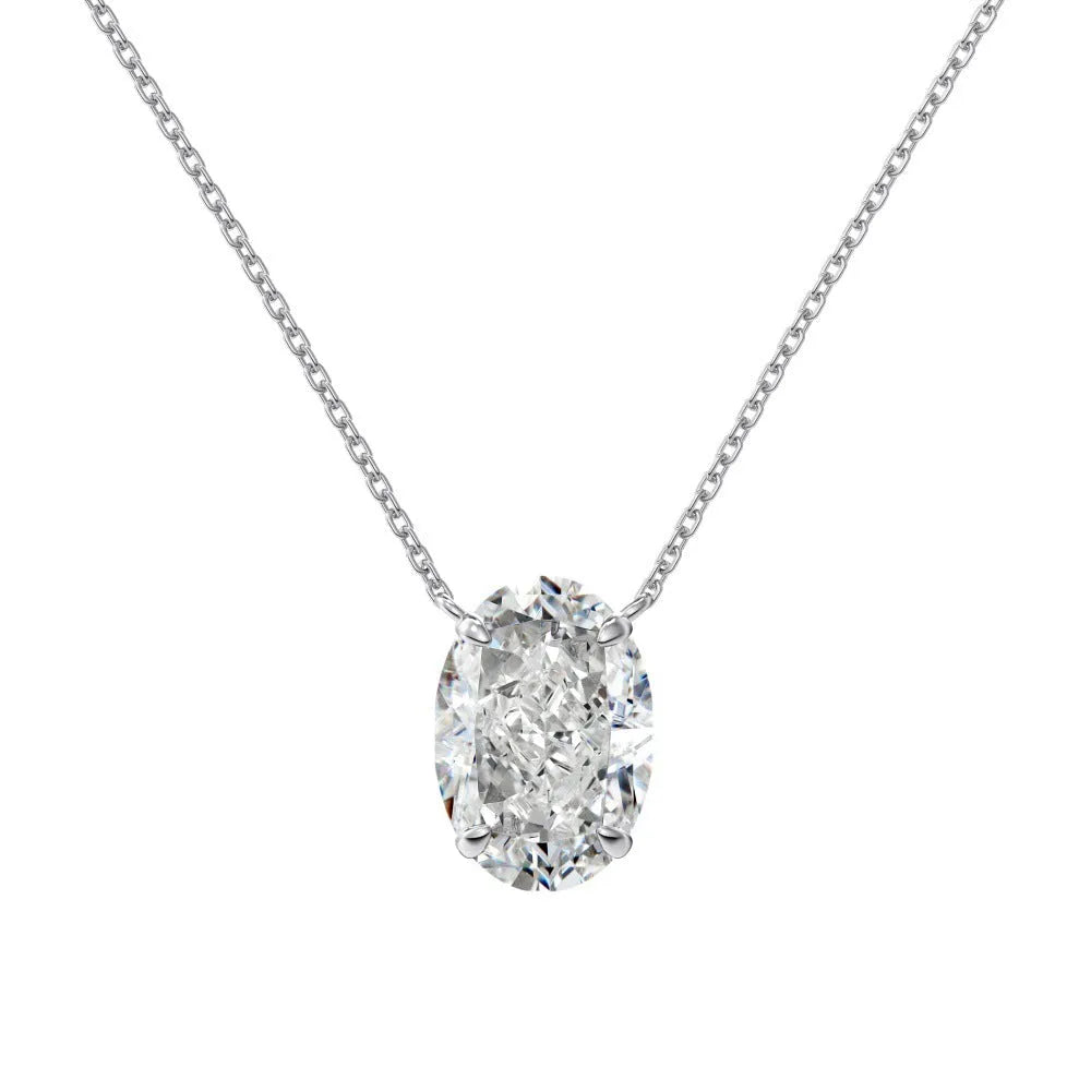 Sterling silver necklace with a geometric oval ice flower pendant in gold or platinum finish.