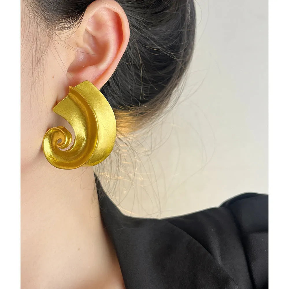 Geometric retro ear studs in gold and silver electroplated alloy, approximately 5cm size with stud fastening