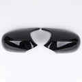 Pair of black and carbon pattern ABS plastic rearview mirror shells for BMW 3 Series E90.