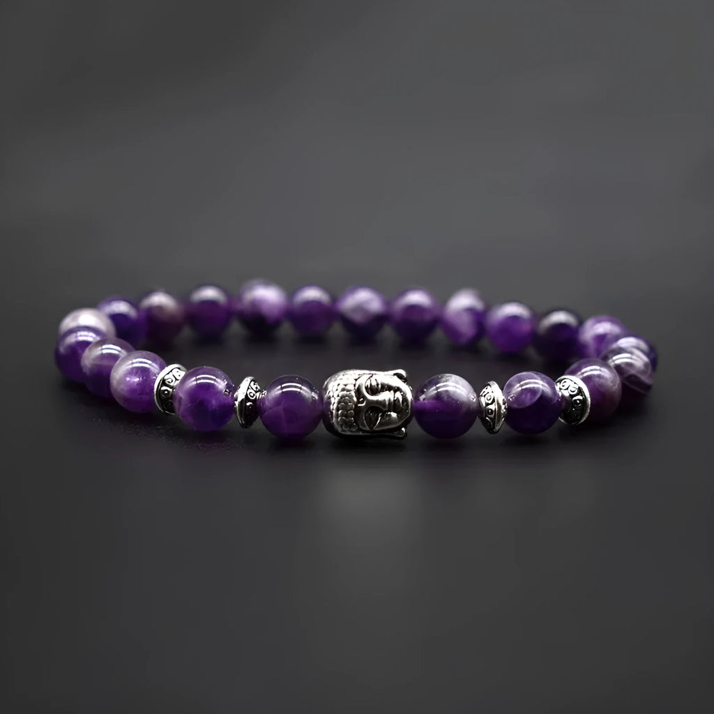 Handcrafted unisex bracelet with a 19mm Buddha head bead in tiger eye stone on wrist.
