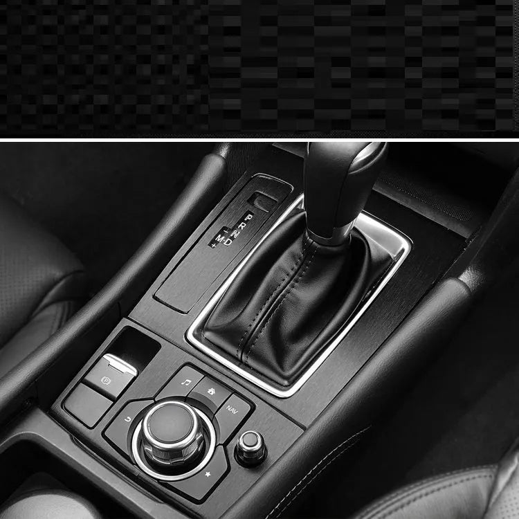 Unksera car interior decorative film sticker kit showing dashboard and centre console application with carbon fibre finish