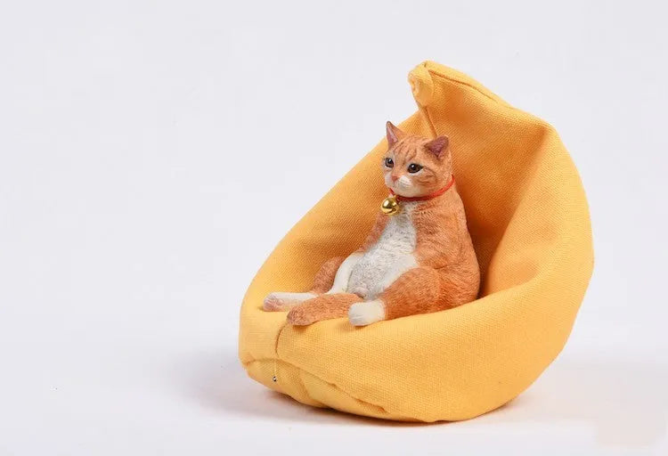 Lazy cat resin car dashboard ornament with sofa, 7.5cm tall