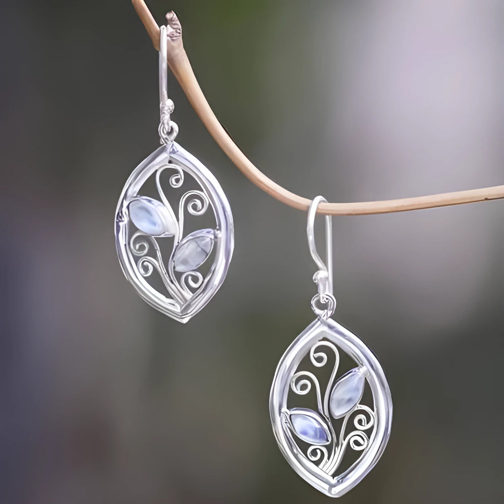 Silver leaf-shaped women's earrings with embedded colourful moonstones