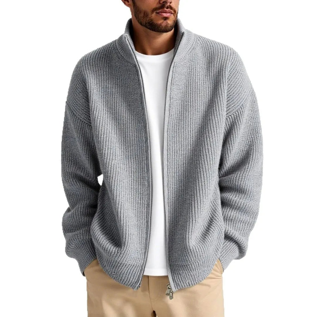Men's loose-fit cardigan sweater in a grey colour, showing button front and long sleeves.
