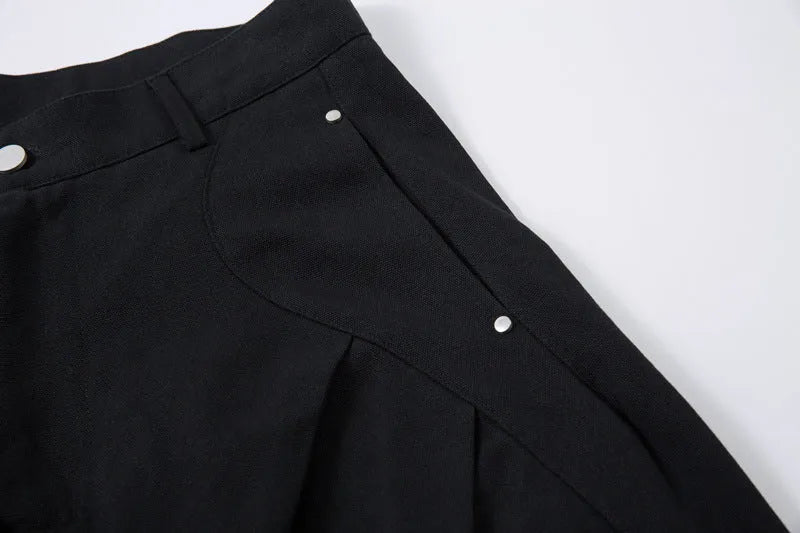 Men's black pleated casual trousers with machete pleats and loose wide-leg fit