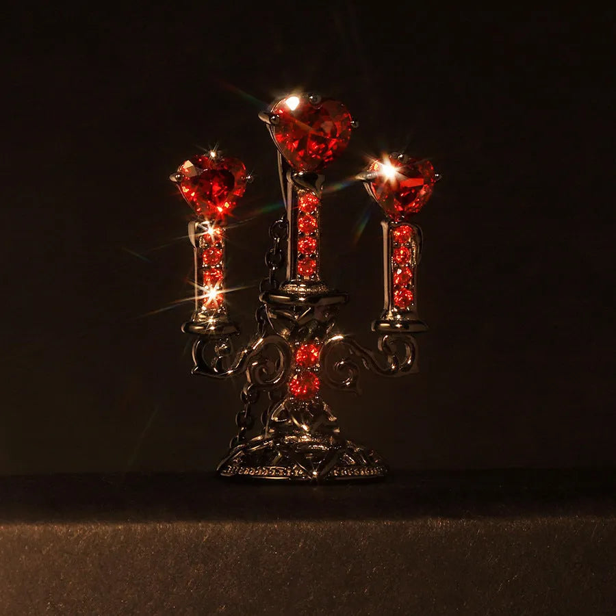 Women's retro gothic necklace with hollow candlestick pendant and cross chain in antique finish.