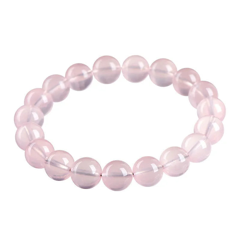 Women's polished crystal round bead bracelet in pink, showing single circle design with various size options.