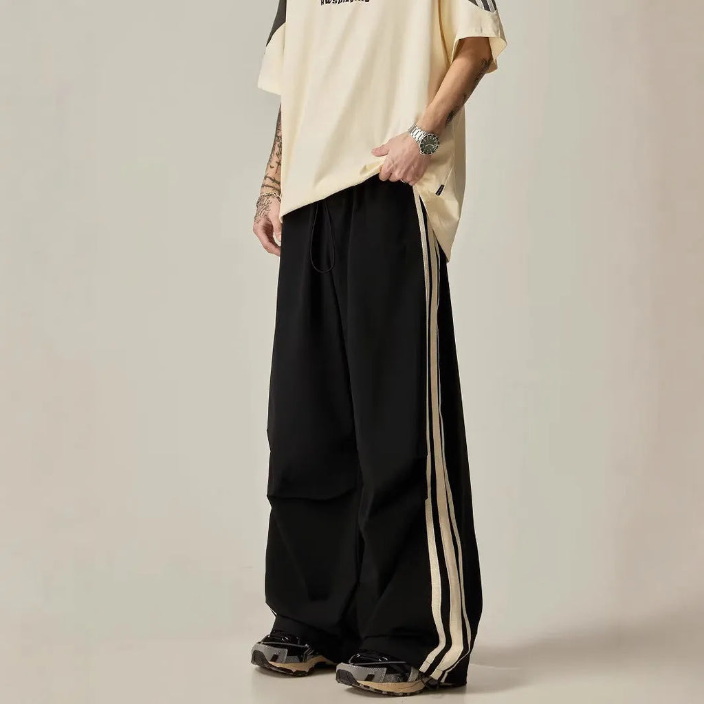 Men's black wide leg climbing trousers with high waist and straight leg design