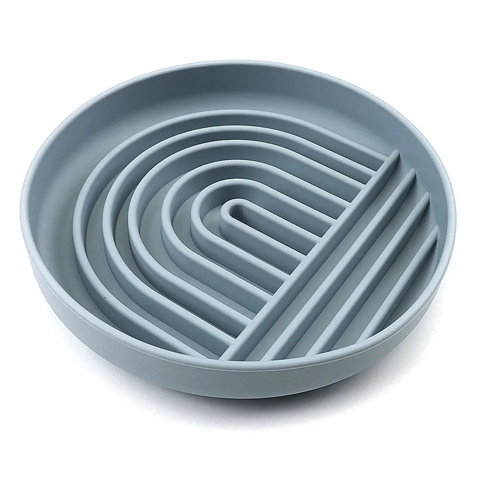 Silicone dog slow feeder bowl with textured ridges, shown in mustard green colour.