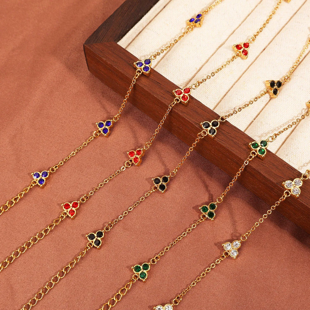 Women's geometric bracelet with triangular diamond cluster in gold or steel stainless steel with coloured stones