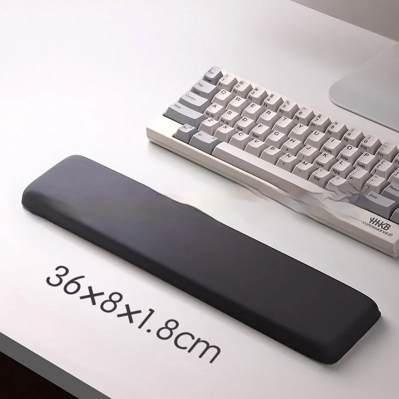 Square silica gel wrist rest mouse pad with strap on a desk, 250mm by 180mm, cloth surface