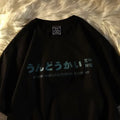A loose-fitting black short sleeve cotton T-shirt laid flat on a surface.