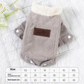 Grey lambswool dog vest with fleece lining for winter warmth on a small dog.
