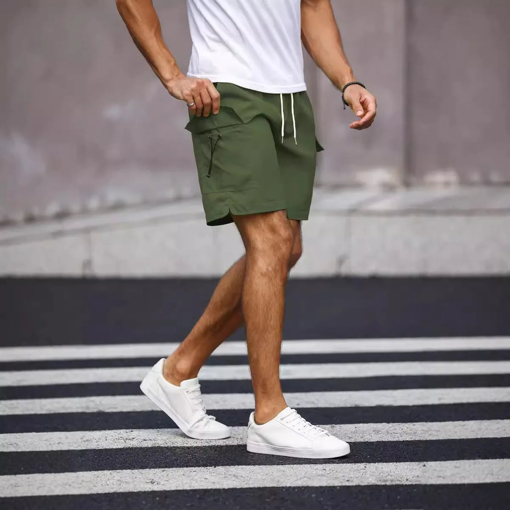 Men's loose fit work shorts in fluorescent green and army green colours with straight leg design