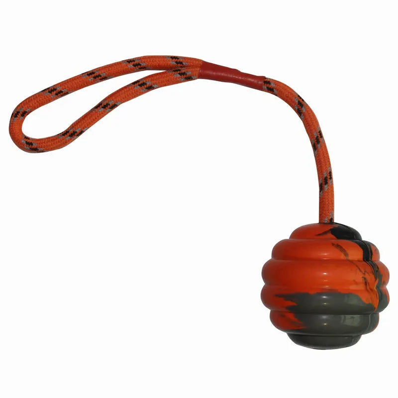 Multi-colour rubber dog training ball with rope knot, measuring 6x30cm