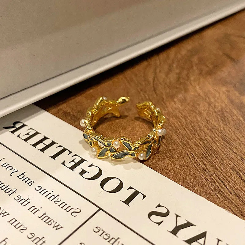Creative Chinese butterfly women's copper ring with dripping oil treatment process in simple style.