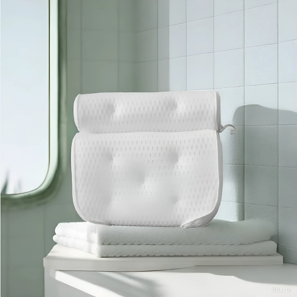White 3D mesh bathtub pillow with seven suction cups on a bathtub.
