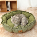 Grey and green reversible donut-shaped cat bed with plush fabric and non-slip base