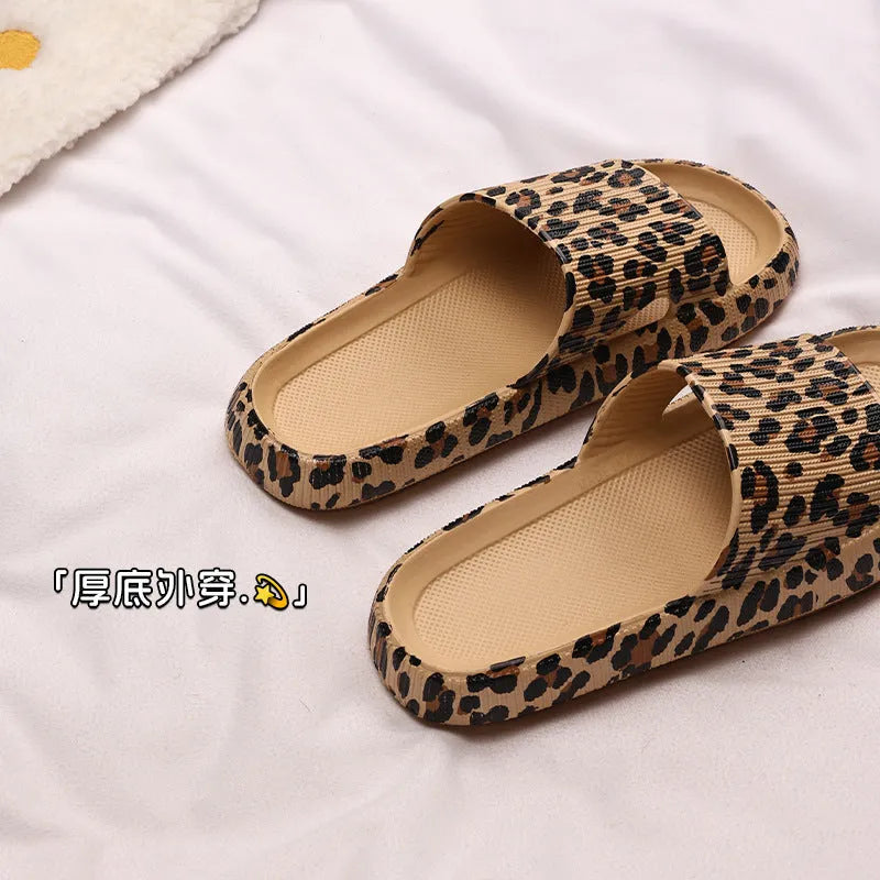 Women's leopard print slipper with thick EVA sole shown in multiple colour and print options.
