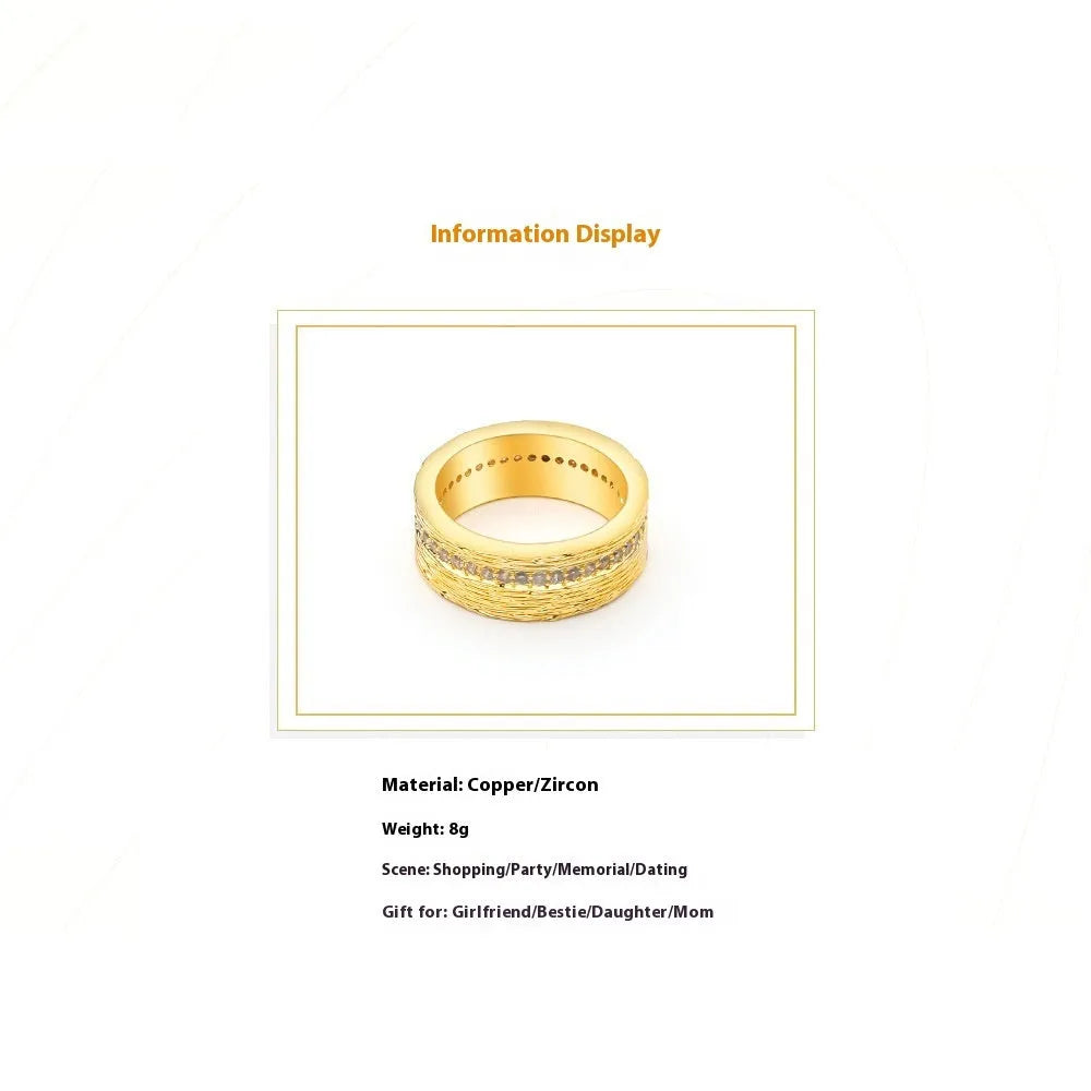 Geometric gold-coloured zircon ring for women, shown in size 7.