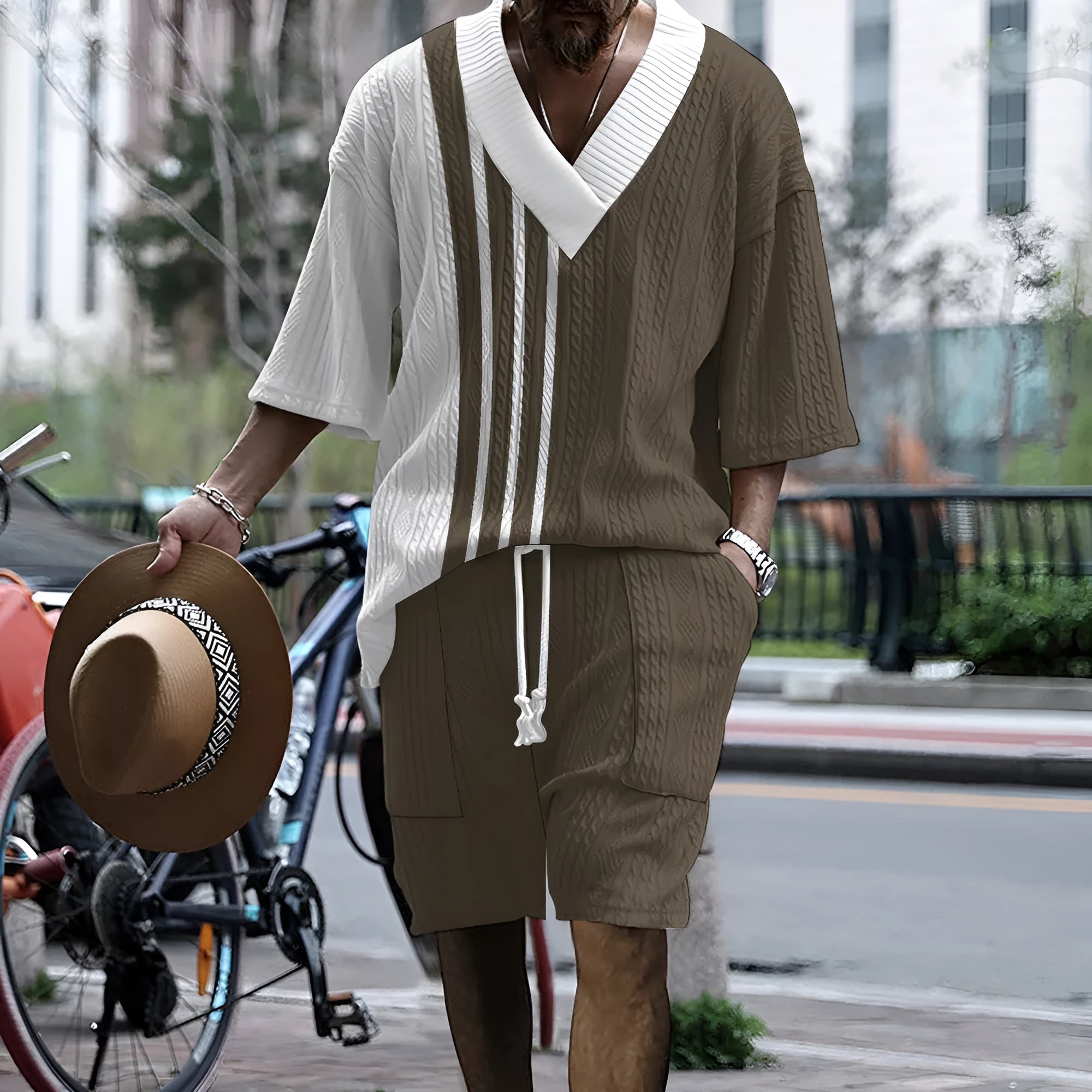 Men's knitted short-sleeved top and matching shorts in a solid colour, showing relaxed drop-shoulder fit.
