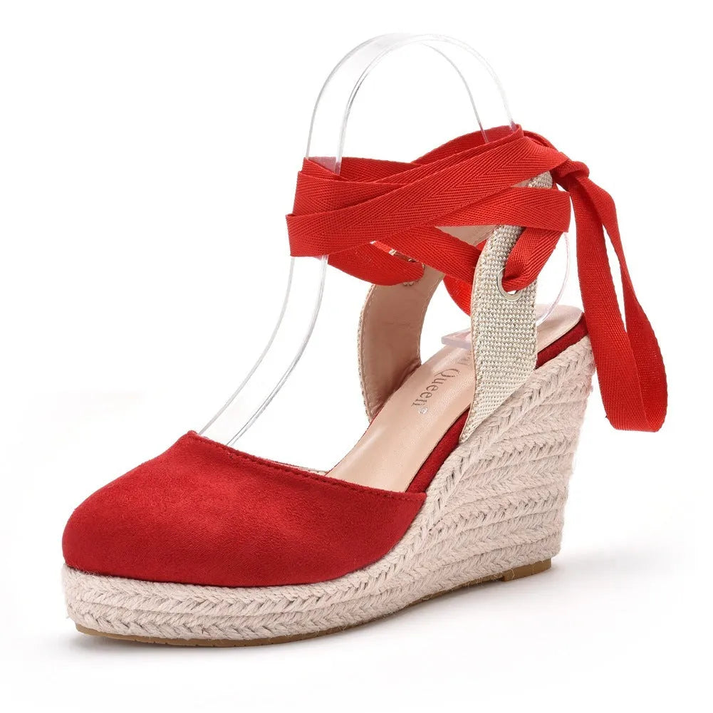 Women's apricot bohemian wedge sandals with beaded tassels and a buckle strap.
