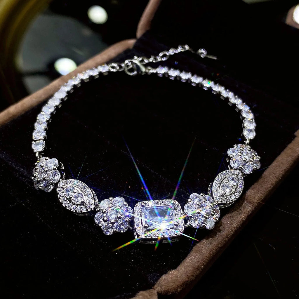 Women's geometric silver-plated bracelet with zircon stones showing adjustable and fixed length options