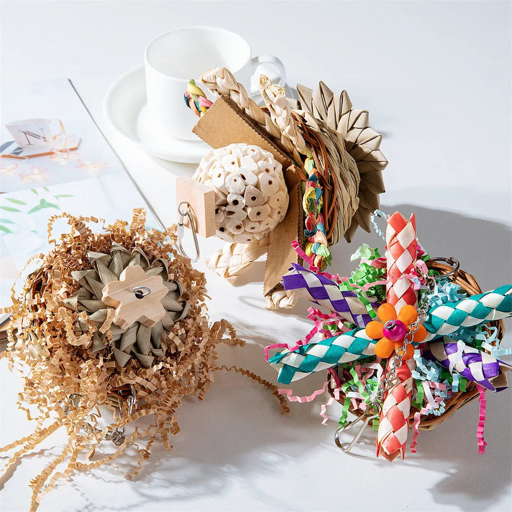 Three natural wood and rope parrot gnawing toys hanging as a bundle for large bird cage enrichment.