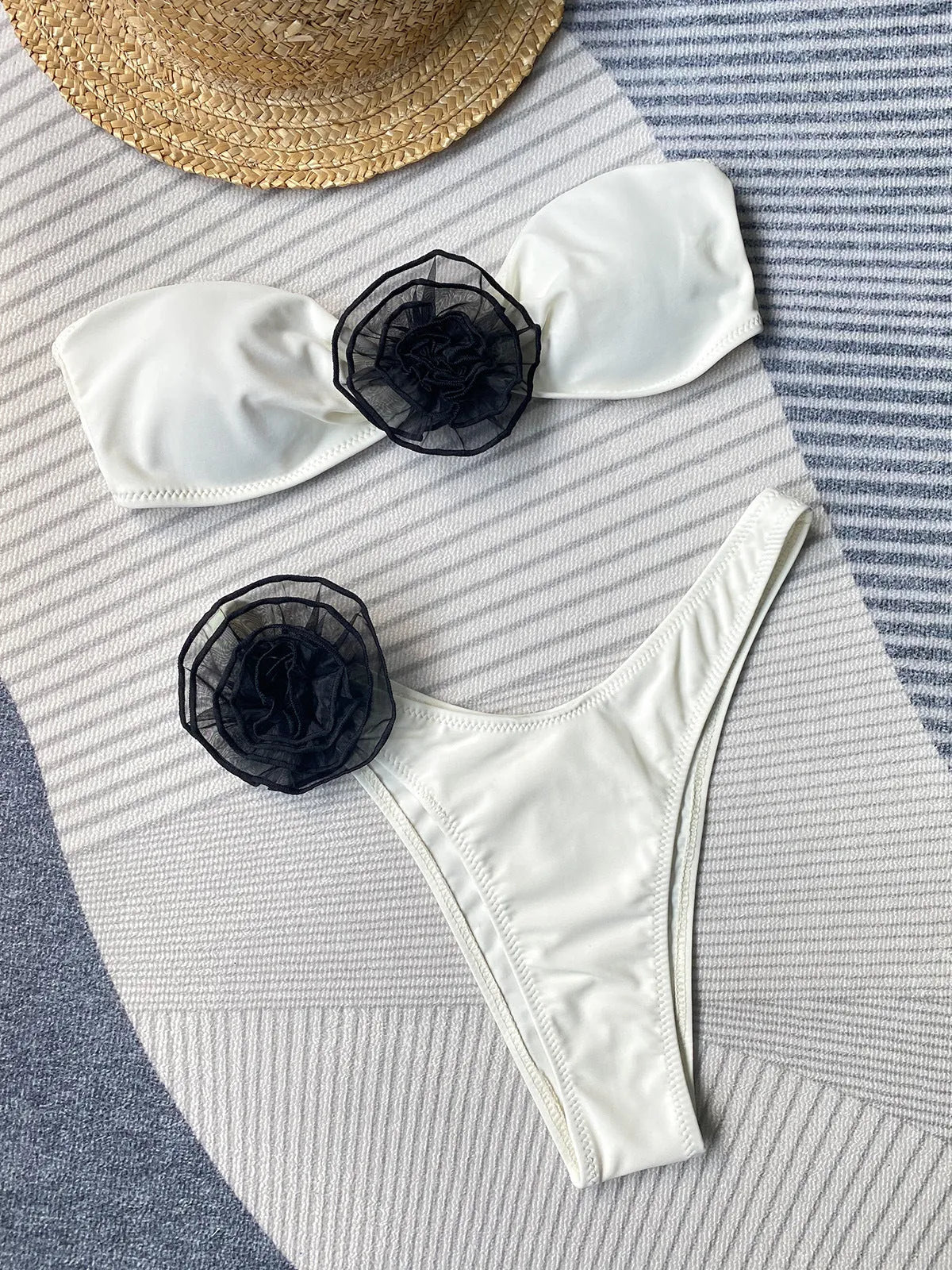 Two-piece bikini swimsuit with tube top and high-waisted shorts in polyester fabric