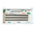 Black V-shaped fishtail false eyelashes showing thick segment design on a clear band.