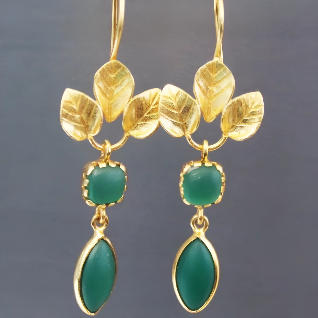 Gold-coloured retro women's drop earrings with a French leaves tassel and water drop design, featuring zircon accents.