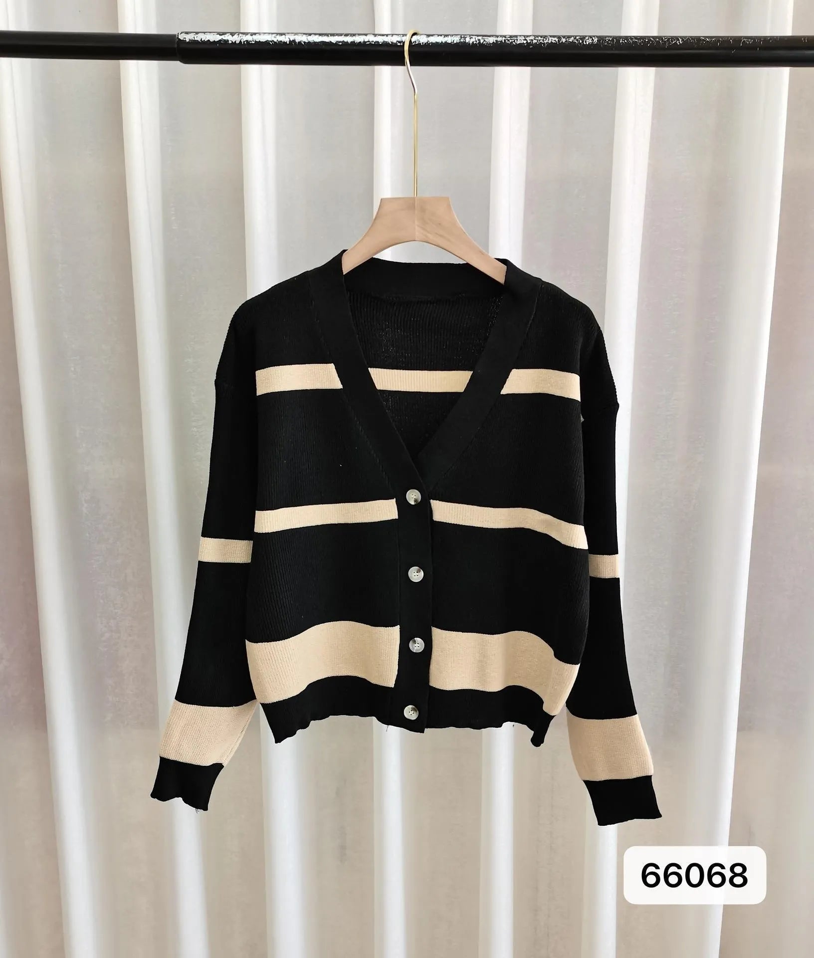 Women's striped knitted cardigan with V-neck, button front, and 3D pattern texture