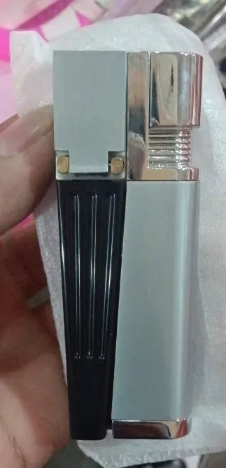 Folding metal pipe lighter showing open position with stash compartment visible