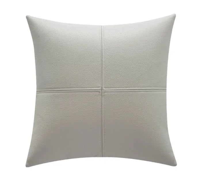 Solid colour soft cowhide leather pillow cover in a Nordic style, shown in beige white.