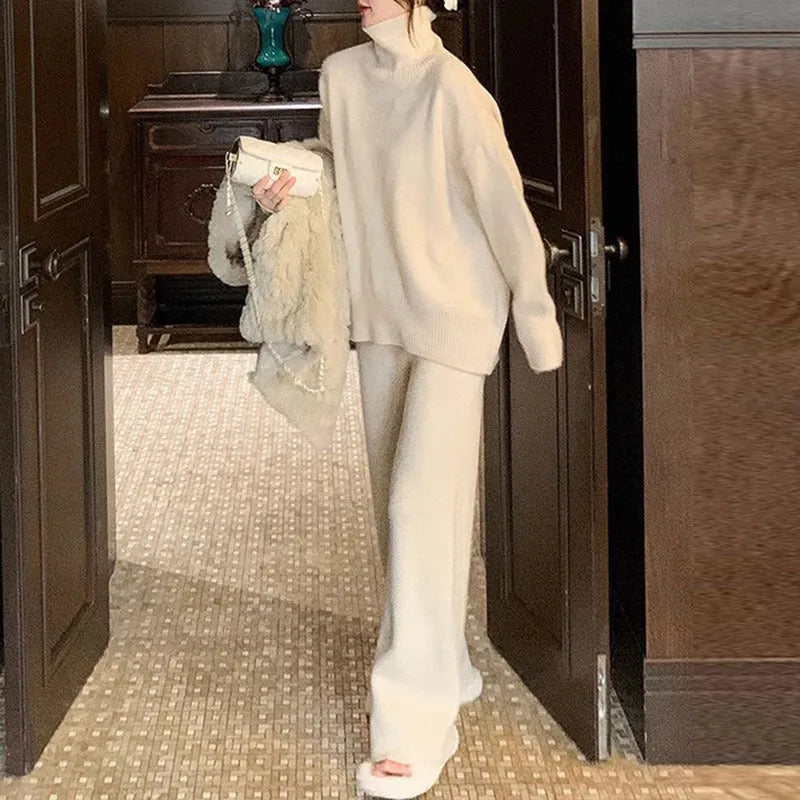 Women's casual acrylic fibre two-piece set with long-sleeve sweater and wide-leg trousers in solid colour.
