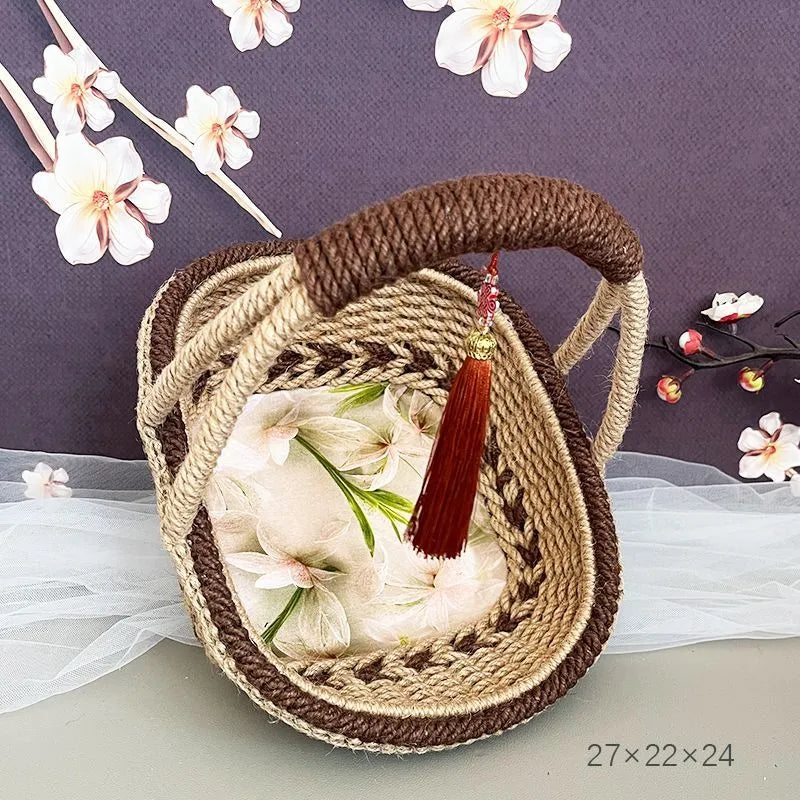 Small hand-woven coffee brown straw basket with retro pastoral style measuring 19x12cm