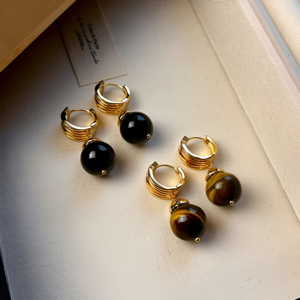 Tigereye geometric earrings with gold plating in brown or black colours featuring circular French retro design