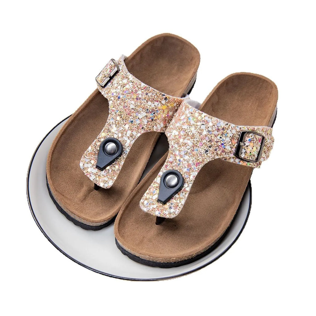 Gold frosted cork flip-flop slippers with hollow-out design and non-slip PVC sole.