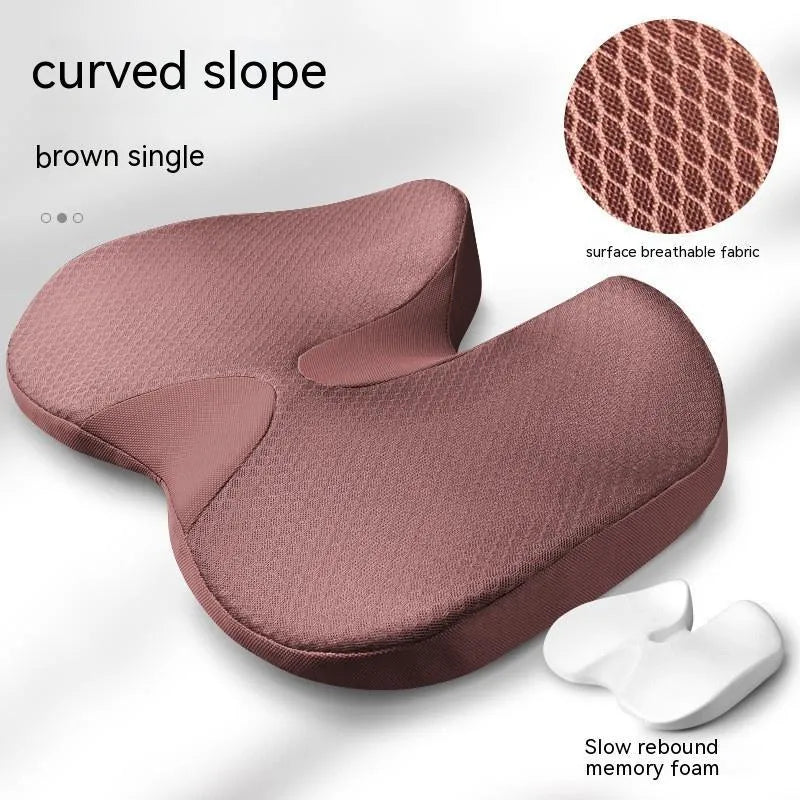 Curved bevel design seat cushion in beige colour, showing its contoured shape for tailbone support.