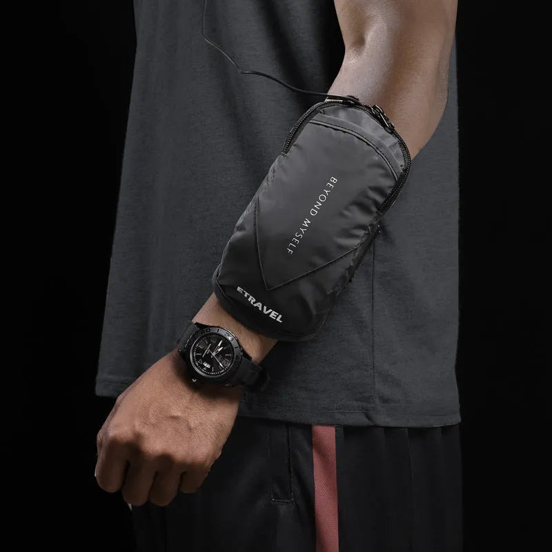Reflective sports arm bag with strap, shown in fluorescent yellow, black, and silver grey colours.