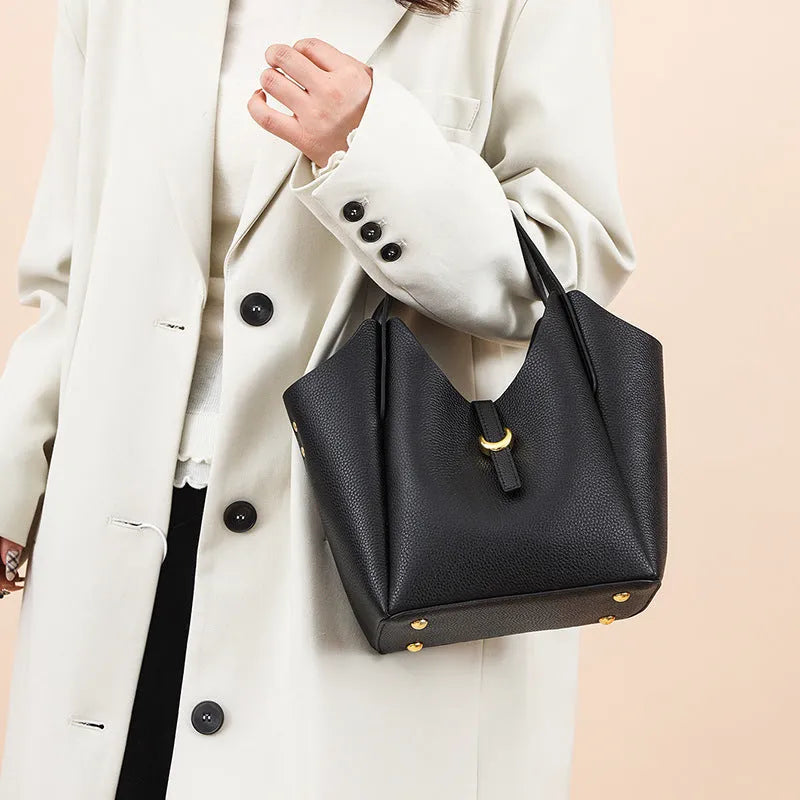 Women's genuine leather bucket handbag in four colours with file compartment and retro sewing details