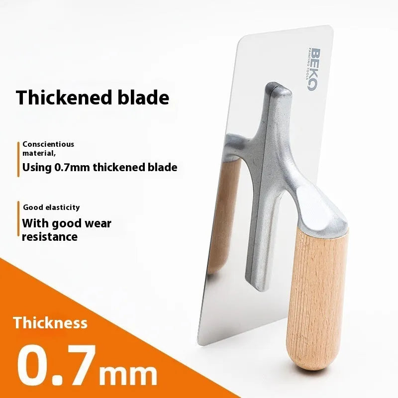 Three stainless steel putty scrapers with wooden handles in different sizes for decorative floor and wall application