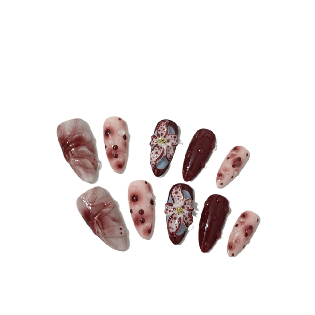 Hand-painted 3D carved manicure nails in almond colour with rose and tulip floral patterns