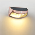 Solar outdoor retro wall lamp with smiling face design and IP65 rating for garden and villa use