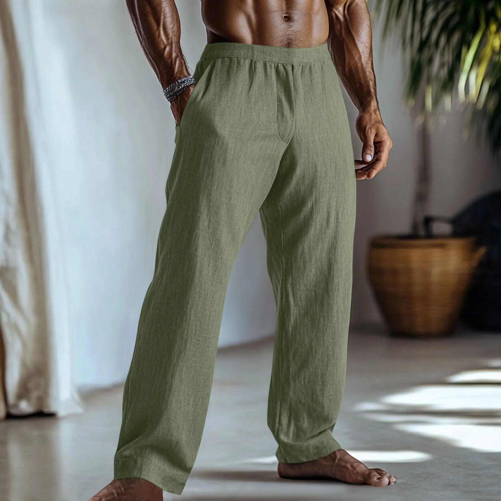 Straight-leg casual trousers in cotton and linen fabric, shown in a light green colour with visible side pockets.