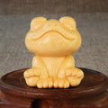 Solid bamboo smiling frog carving ornament measuring 5cm tall with cartoon design