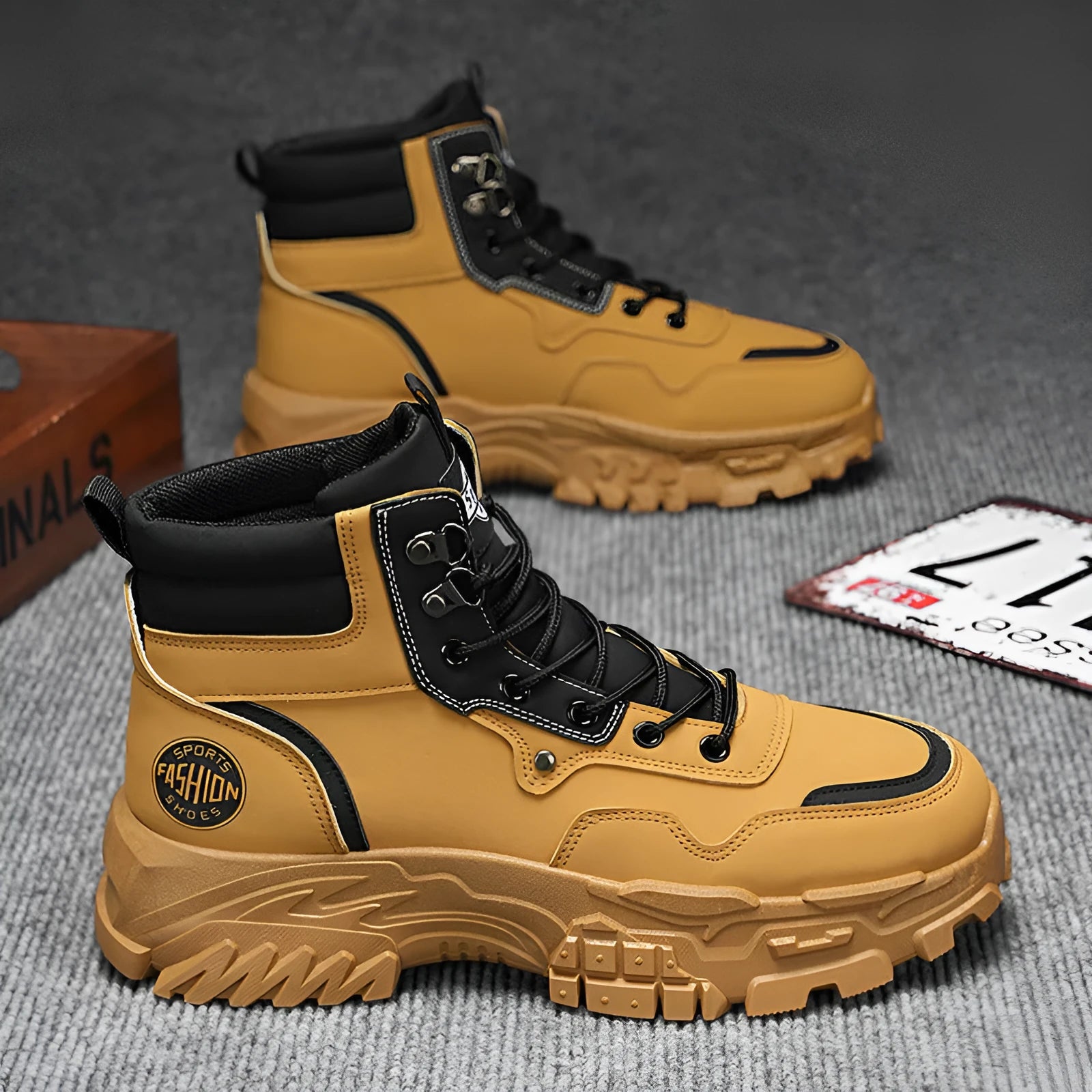Men's black and yellow high-top Martin boots with a mid heel on a white background.