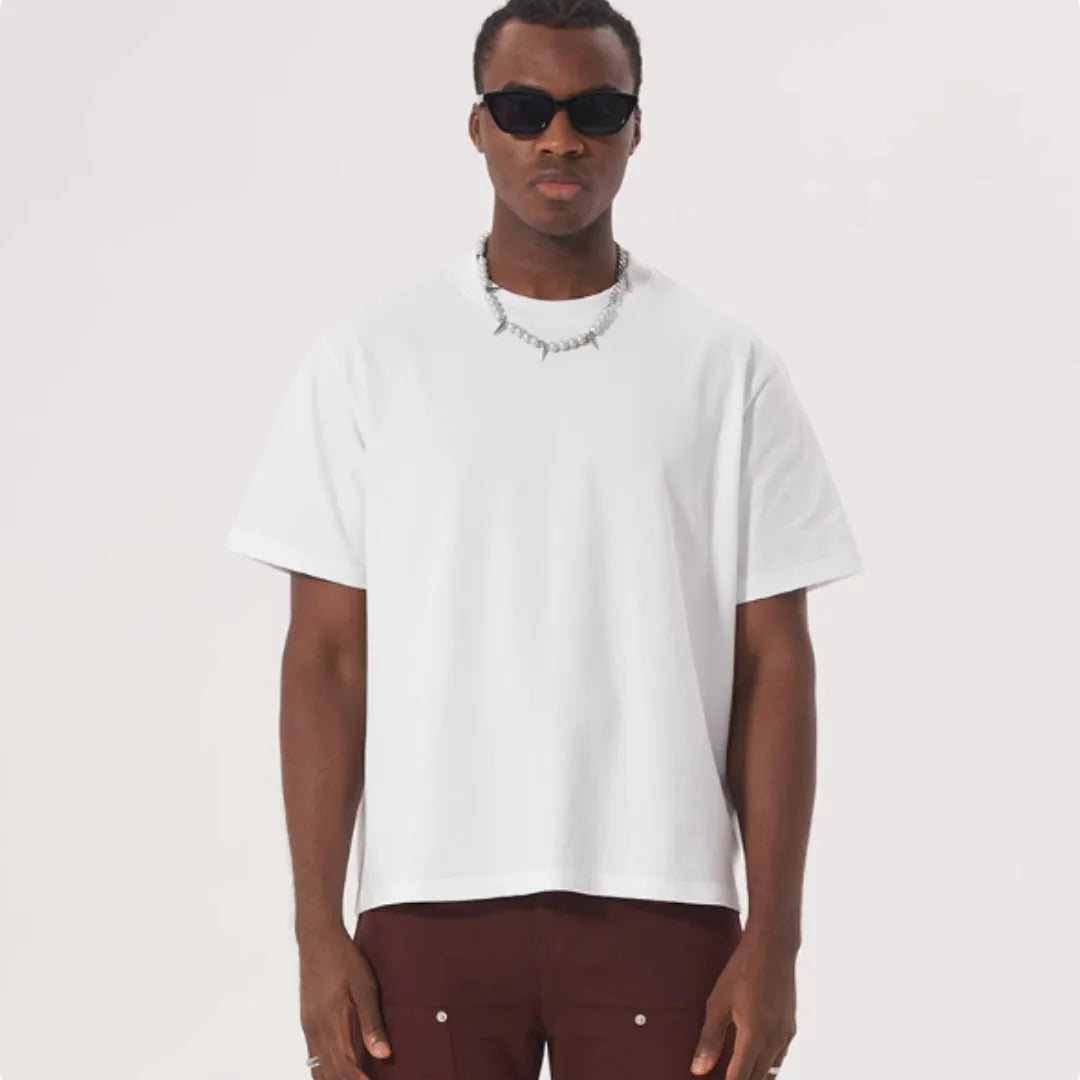 American style loose fit pure cotton t-shirt in apricot colour on a hanger.
